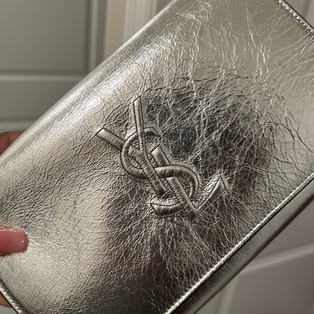 YSL POCH 9"W x 6"H x 1"D
19" strap drop